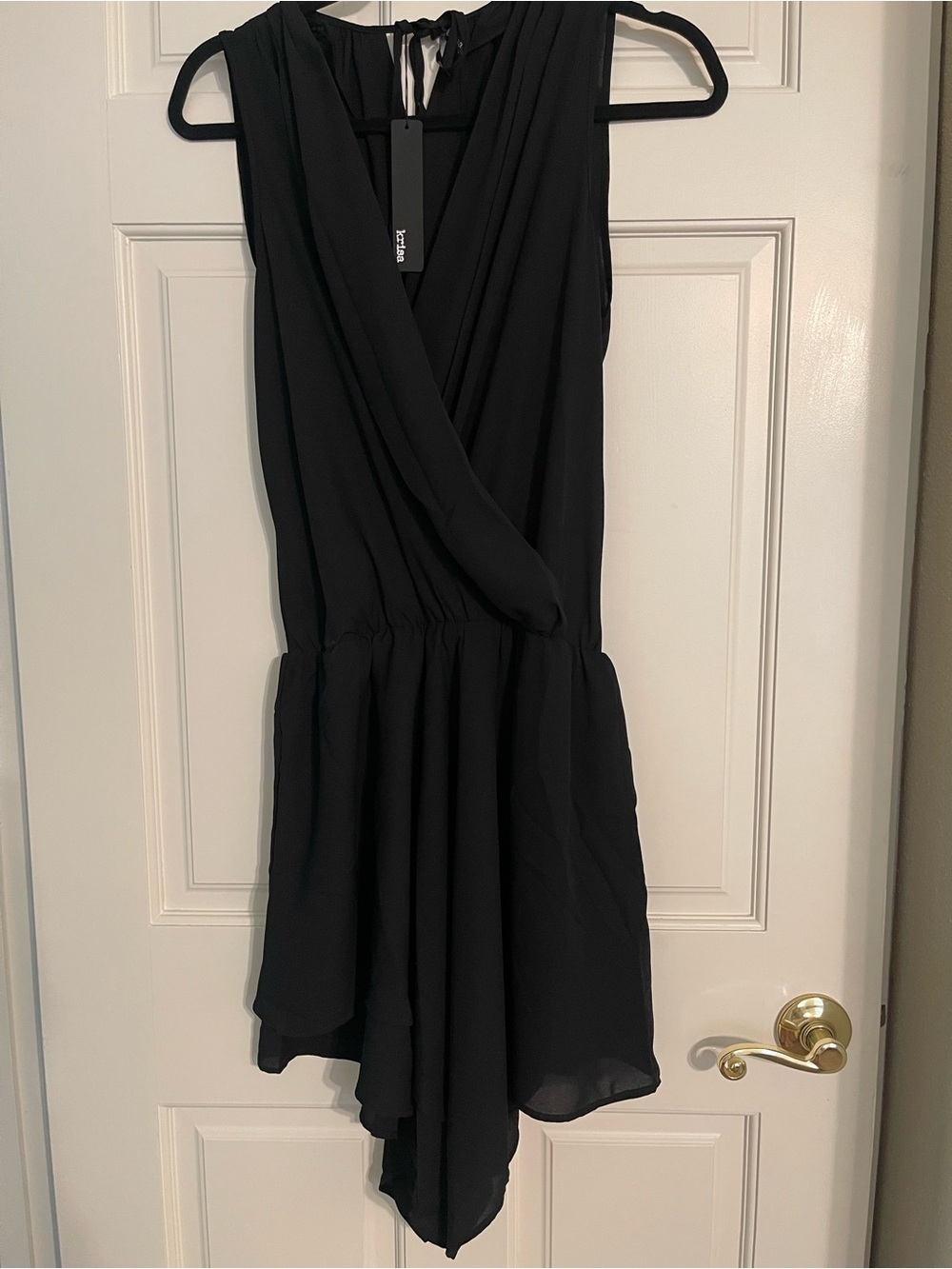 Elegant Black Sleeveless Surplice Mini Dress